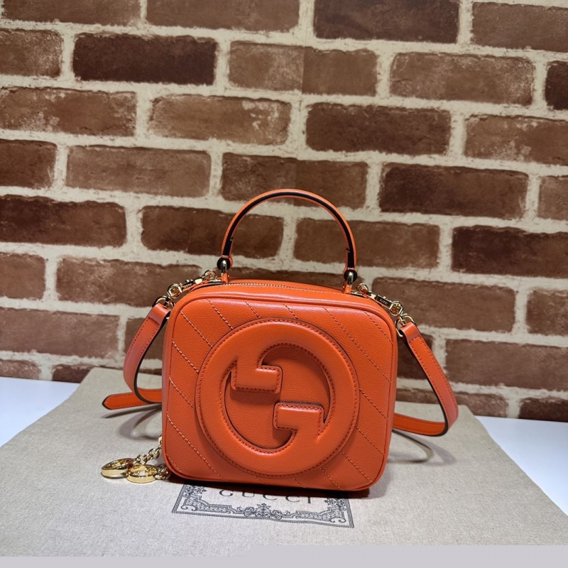 G*u*i top handle bags